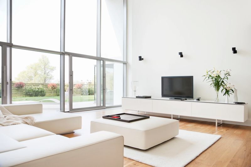 Beautifully staged living room with fresh paint and new carpeting