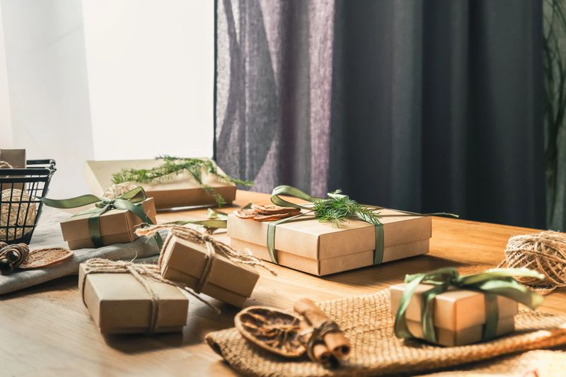 Christmas gift zero waste, eco friendly hand made box packaging gifts in kraft paper wooden table, eco christmas holiday concept, Christmas gift wrapping,eco decor banner