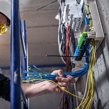 Commercial electrician performing electrical service for business in Cenla