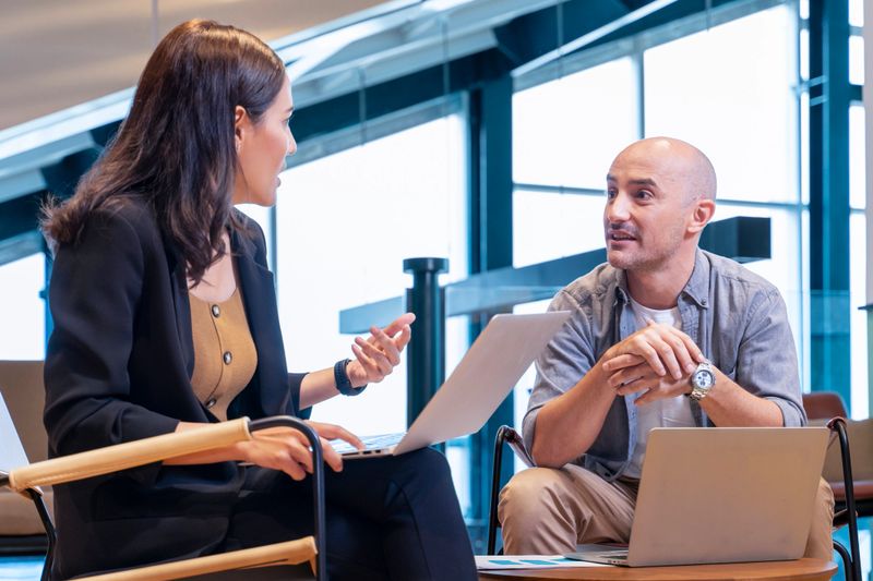 Customer is listening to banker suggestion on mutual fund that he would like to invest for investment and financial advice