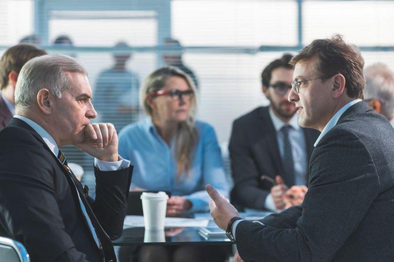 close up. serious business people discuss problems at a work meeting