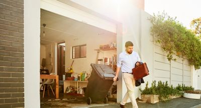 KERN COUNTY JUNK REMOVAL employee removing trash and tools from a kern county resident's home.