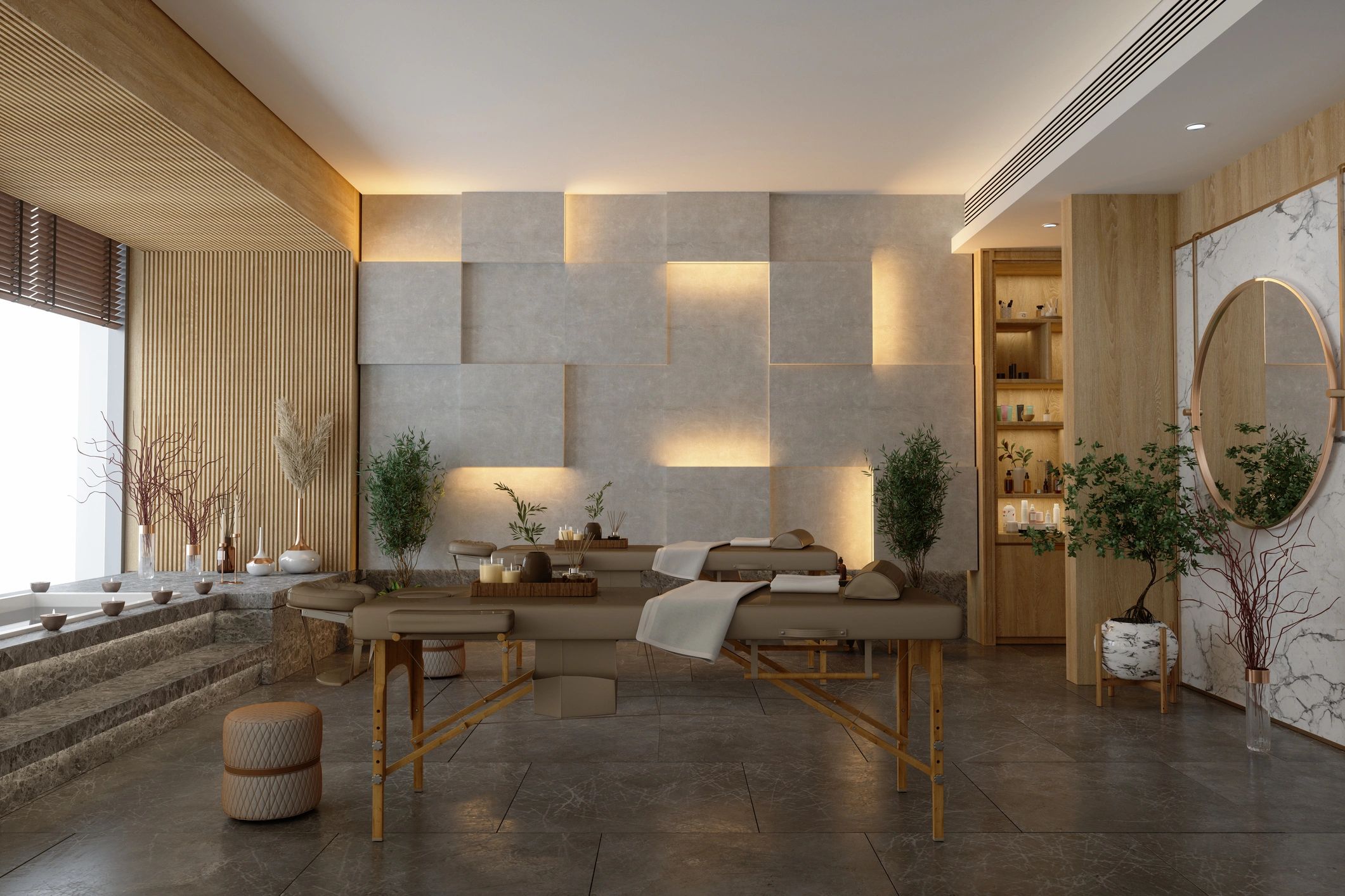 Calm, modern spa room with massage tables and soft lighting.