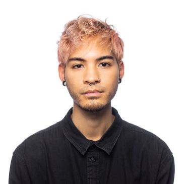 Young person with dyed hair and piercings in a black shirt.