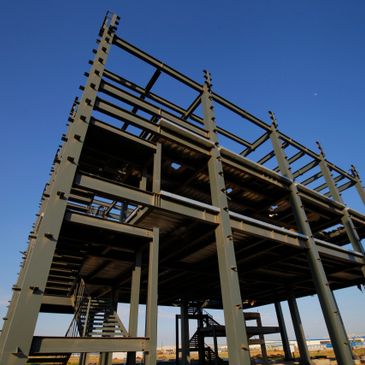 Steel frame structure of a building under construction.
