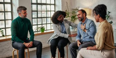 A support group session with empathetic members.