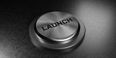 Close-up of a launch button, illustrating transaction management and execution