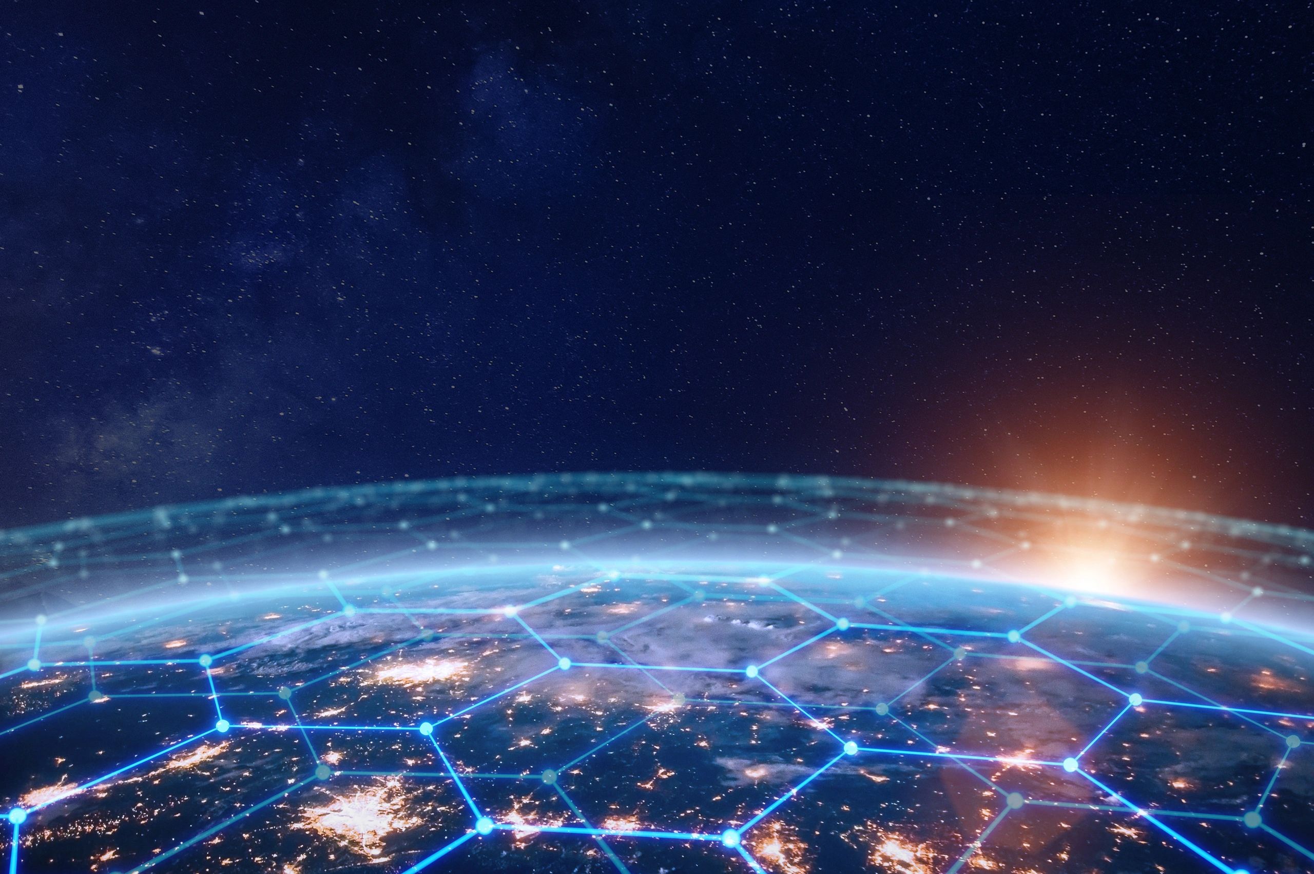 Digital network connections over Earth at night with stars.