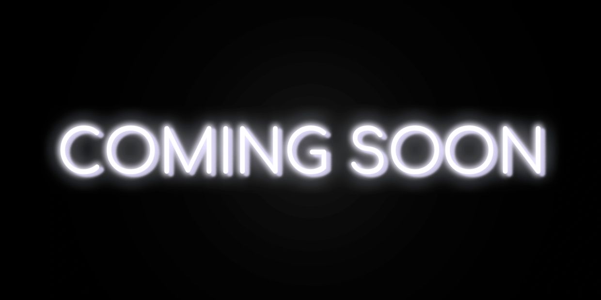 White neon text says "COMING SOON" on black background.