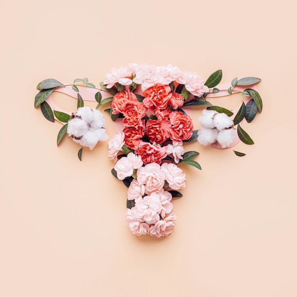 Floral arrangement shaped like a uterus.
