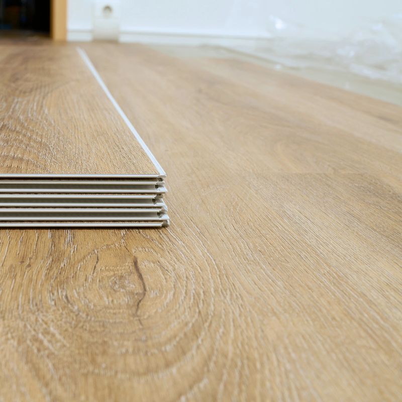 Click vinyl flooring to install yourself in the living room of an apartment
