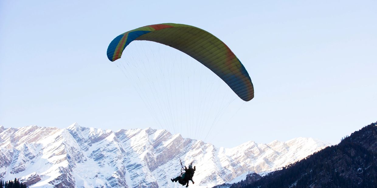 Paragliding in Himachal Pradesh | Bir-Billing, Solang & More | Xplore Tour Packages