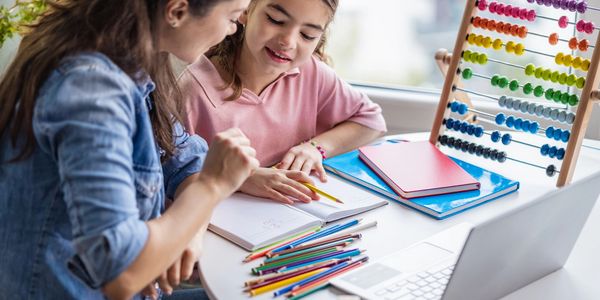 a tutor helping a student learn, one on one tutoring service