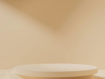 Minimalist beige round pedestal against soft background.
