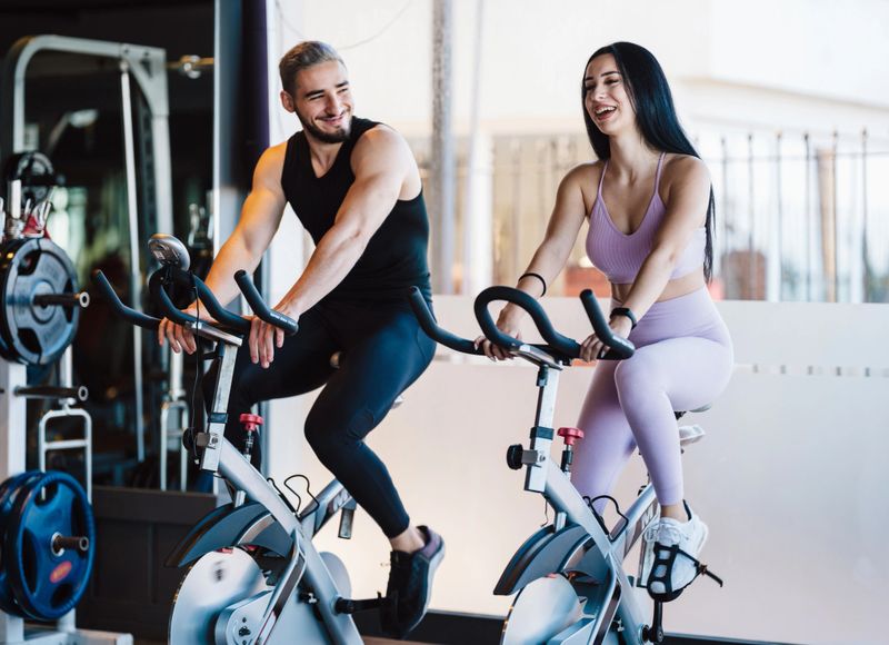 Man And Woman Doing Exercises In The Gym