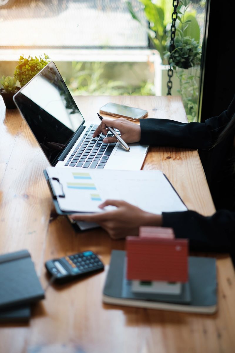 A woman sitting at office company responsible for work audit house .Real Estate House Appraisal And Inspection concept