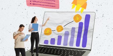 People analyzing financial growth on a laptop screen.