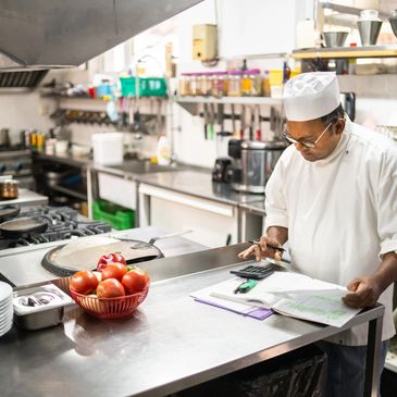 a man working in a kitchen