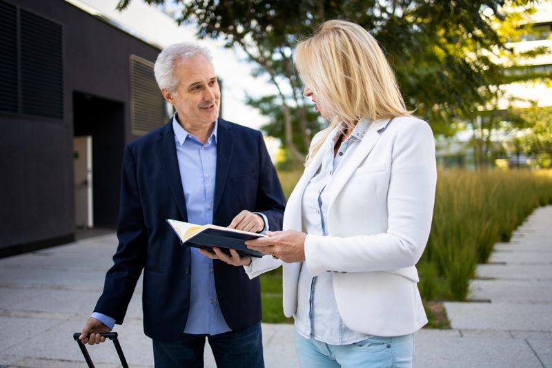 color photography,50-59 years,60-69 years,suit,green color,Serbia,suitcase,sun,sunny,fashion,horizontal,photography
