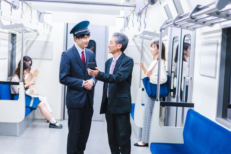 Conductor taking care of a customer