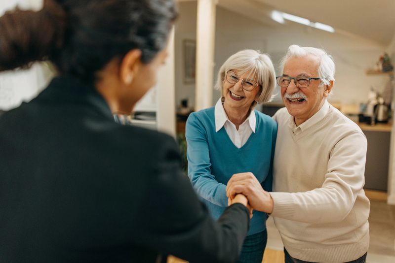 Senior couple buying an apartment