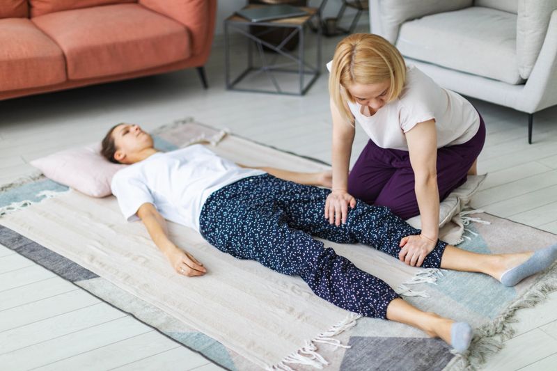 Young woman making body massage