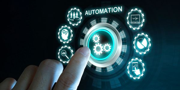 Finger interacting with a digital automation interface featuring gears and icons.