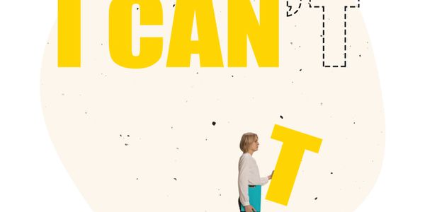 A woman holding a yellow 'T' to complete the phrase 'I CAN'T' into 'I CAN T'.