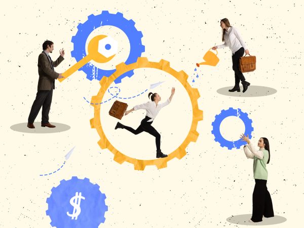 People interacting with colorful gears symbolizing teamwork and business growth.