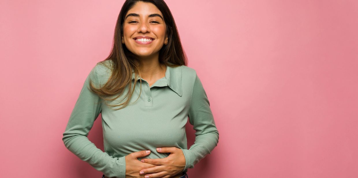 woman feeling better about her gut health after an iv therapy
