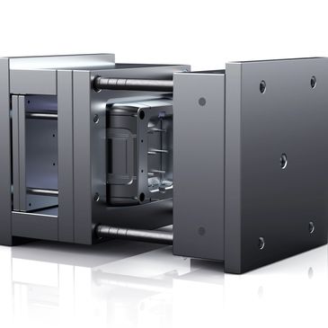 A shiny metal injection mold tool used in manufacturing.