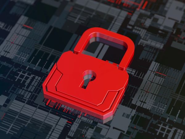 Red padlock on a digital circuit board symbolizing cybersecurity.