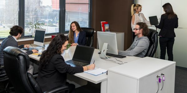 A diverse team working together in the office.