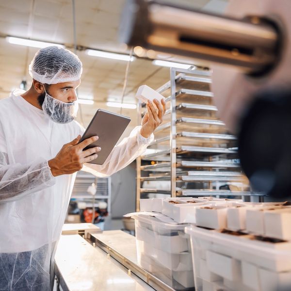 A man checking quality of the product