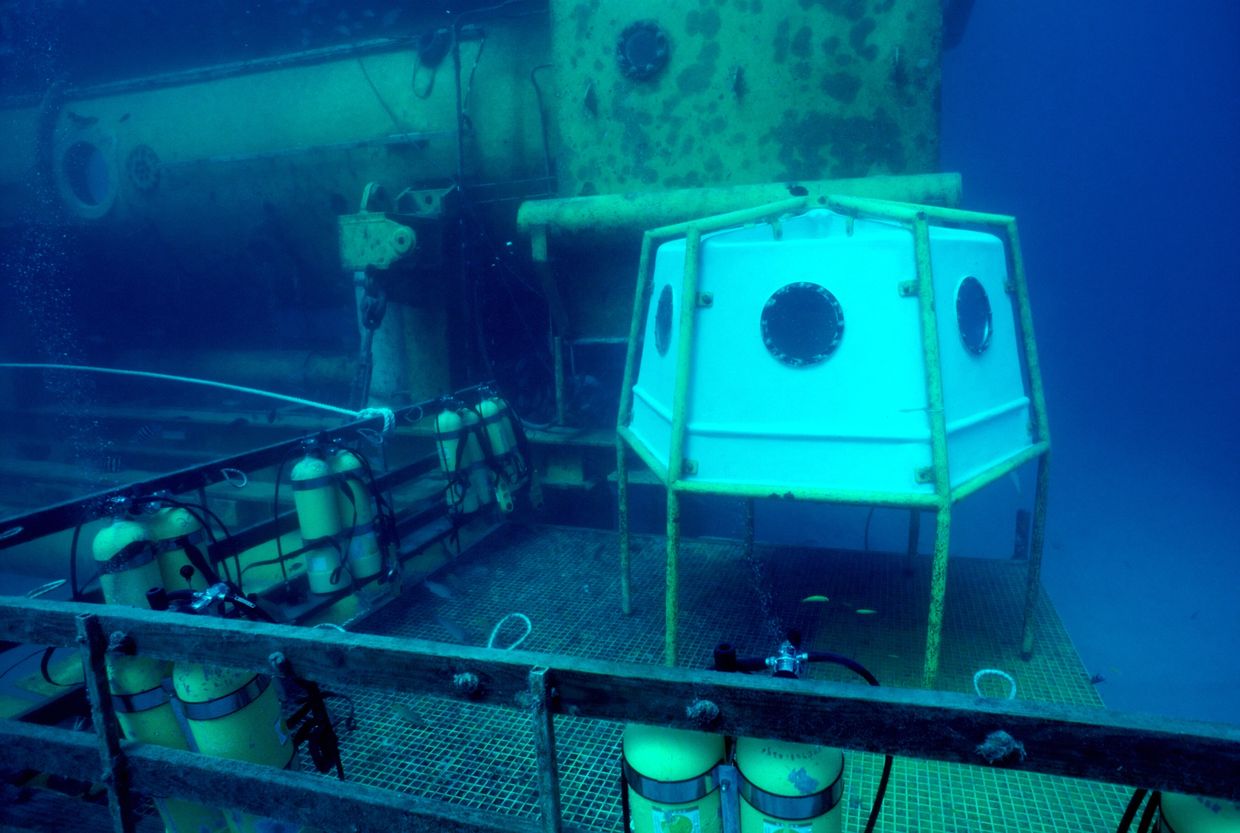 Underwater submersible with scuba tanks and observation pod.