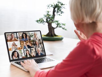 Small group on a video call, representing GLP-1 coaching clients in an online group support session