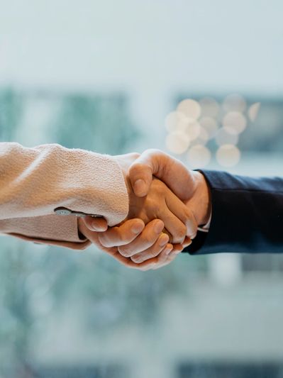 Two people shaking hands