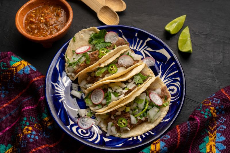 Slow cooked beef barbacoa tacos. Traditional mexican food