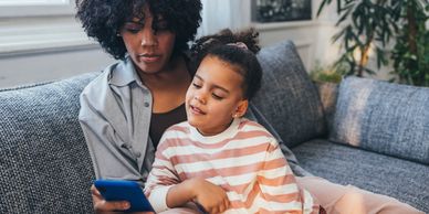 Mother studies with daughter