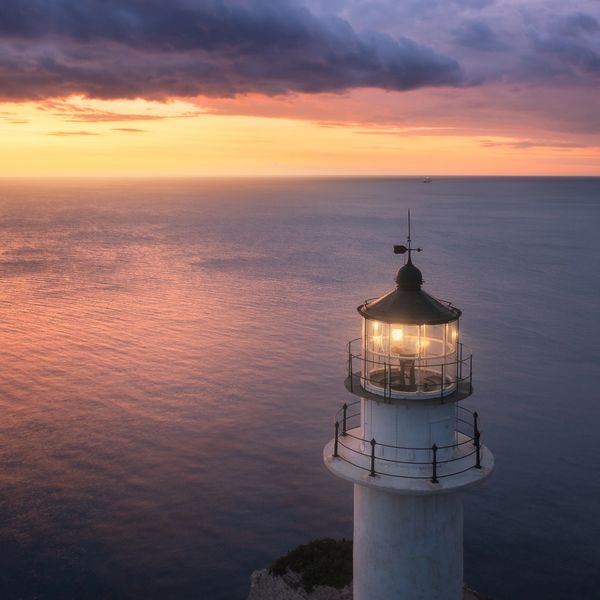 Lighthouse at sunset symbolizing guidance in Maryland mental health care, therapy, and counseling 
