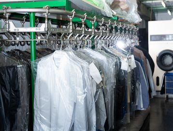 Clothes that have beeb dry cleaned and are ready to be picked up by the customer