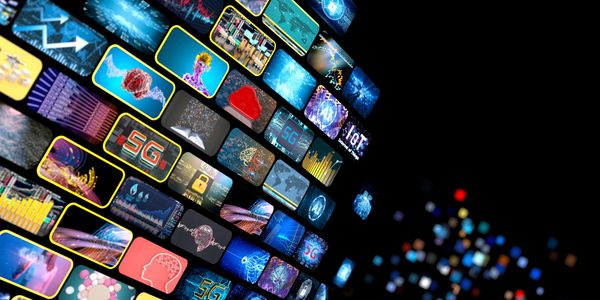 Digital screens displaying technology themes like 5G, AI, and IoT.