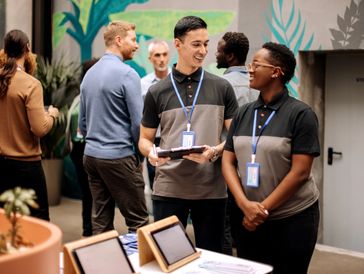 Diverse team working together happily