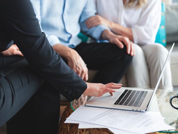 Group of people doing online consutaltion on laptop 