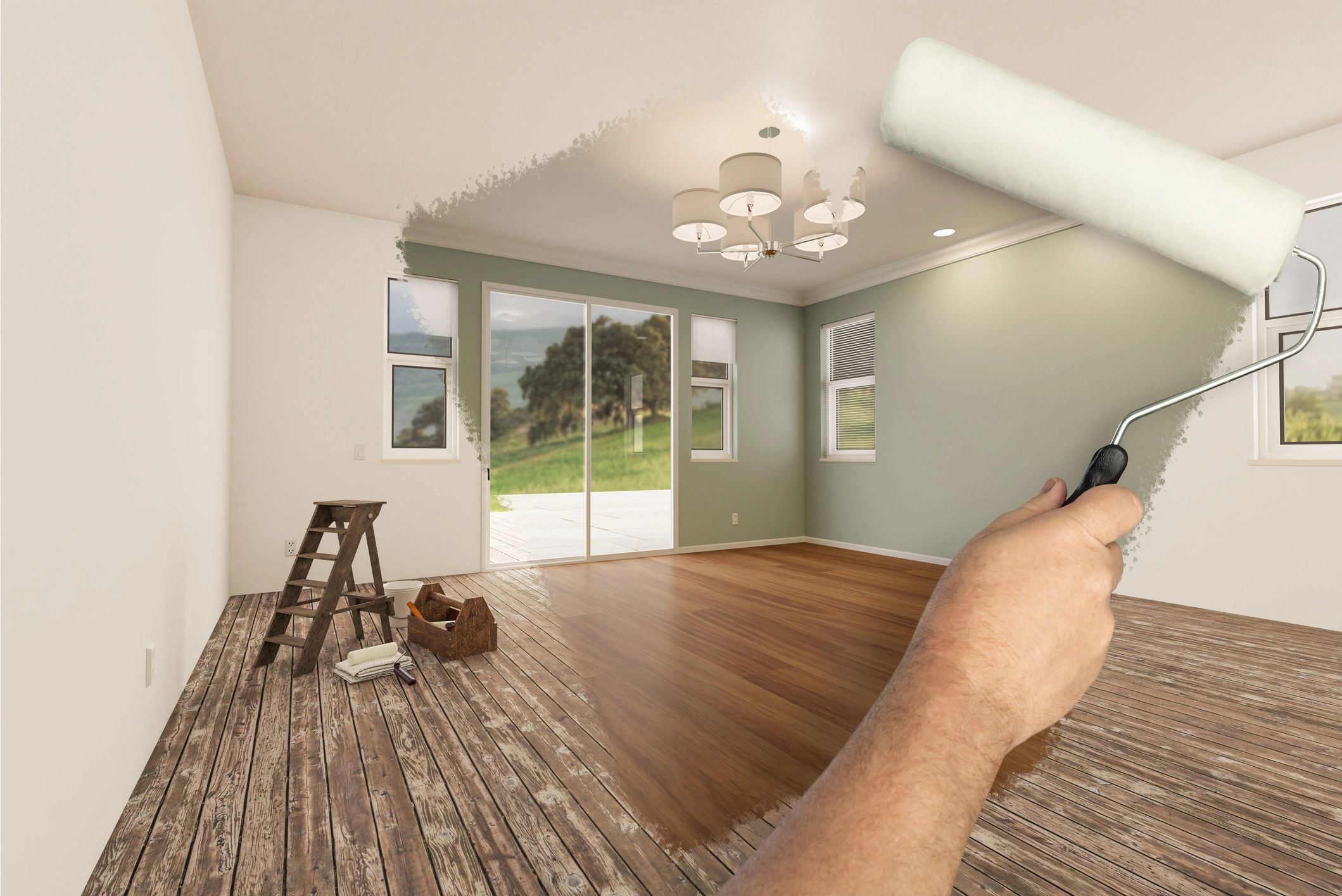 Room being painted from white to green with roller.