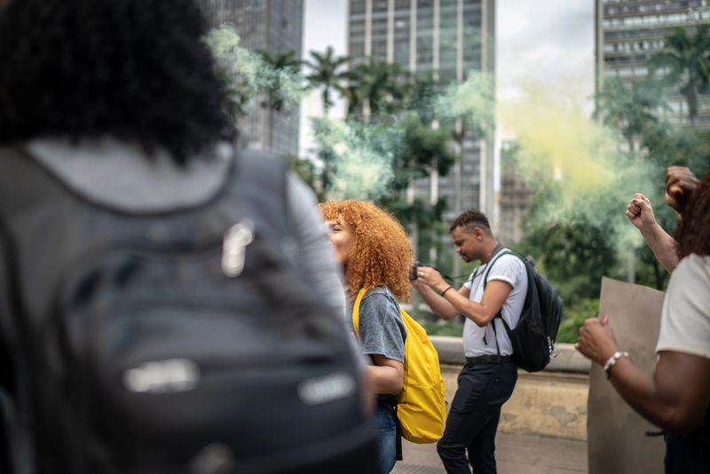 Protesters marching during a demonstration outdoors