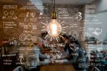 Business meeting with data and analytics overlay.
