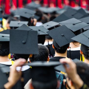 A group of graduates in their robes and caps