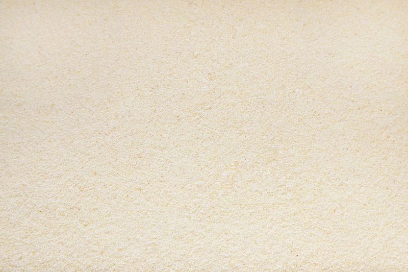 Small white semolina texture in background solid layer