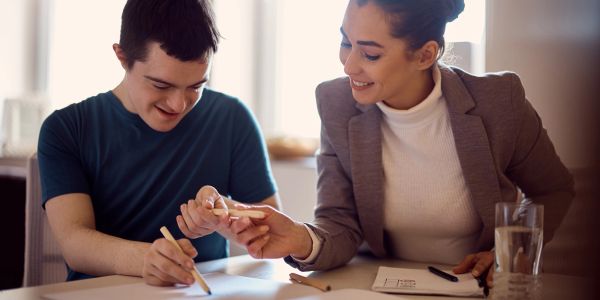 A tutor helping a student with his homework.